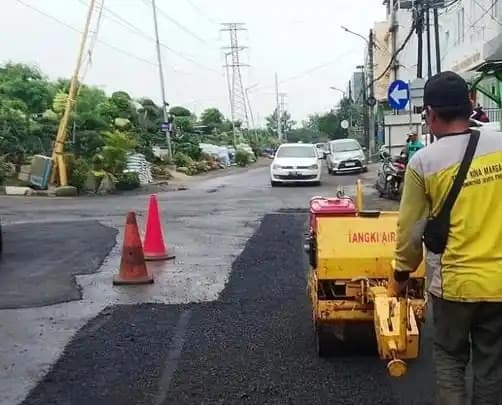 Perbaikan Jalan Rusak