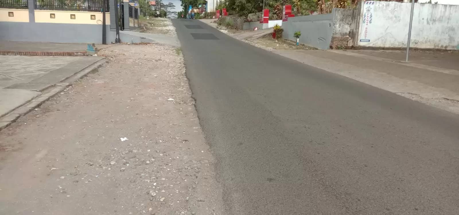Jelang Akhir Tahun, DPUBM Kabupaten Malang Realisasikan Pengaspalan Jalan di Desa Harjokuncaran