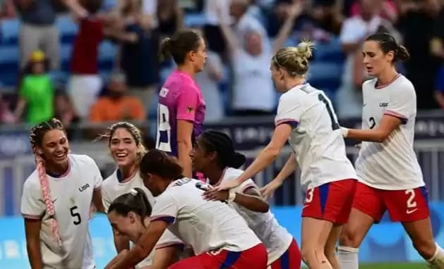 Foto Para pemain Amerika Serikat merayakan gol