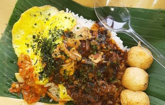 Dibalut Daun Pisang, Nasi Bungkus ala Jepang Jadi Incaran Wisatawan di Bali