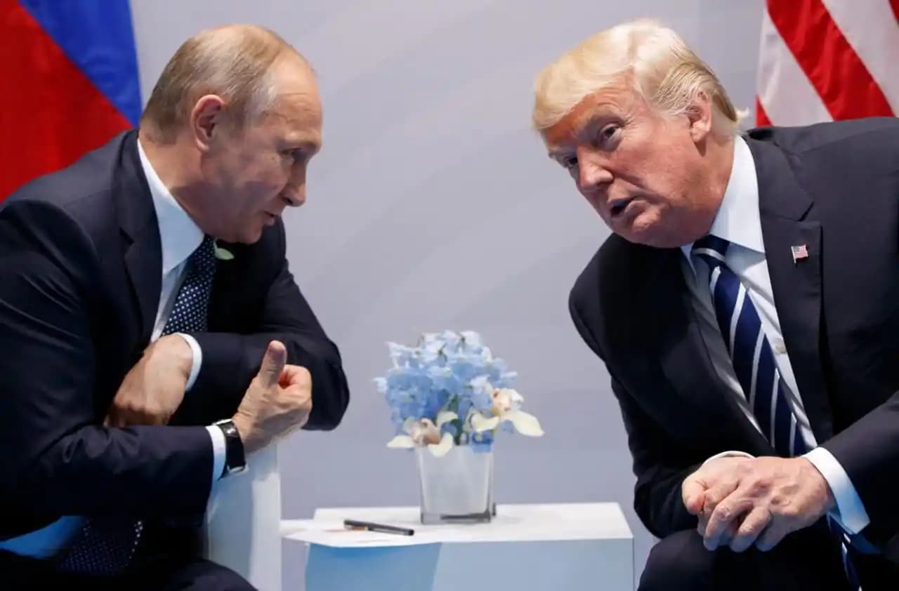 Presiden Rusia Vladimir Putin dan Presiden Amerika Serikat (AS), Donald Trump