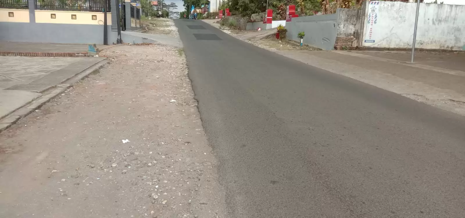 Kondisi jalan rusak di Desa Harjokuncaran yang sudah diperbaiki. (Foto: MI/Rina Sugeng Yuliani)