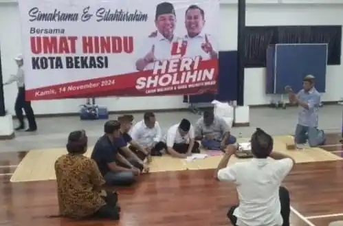 Pasangan Calon Wali Kota Bekasi, Heri Koswara-Sholihin Saat  Berkunjung ke Parisada Hindu Dharma Indonesia Kota Bekasi (Foto: Istimewa)