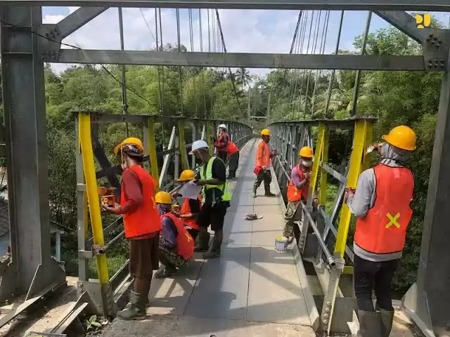 Ilustrasi pekerja sedang membangun jembatan (Kementerian PUPR)